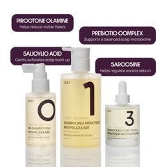 Three VOOY anti-dandruff shampoo bottles arranged on a white background with dark purple text callouts naming ingredients: Piroxtone Olamine, Prebiotic Complex, Salicyloyl Acid, and Sarcosine.