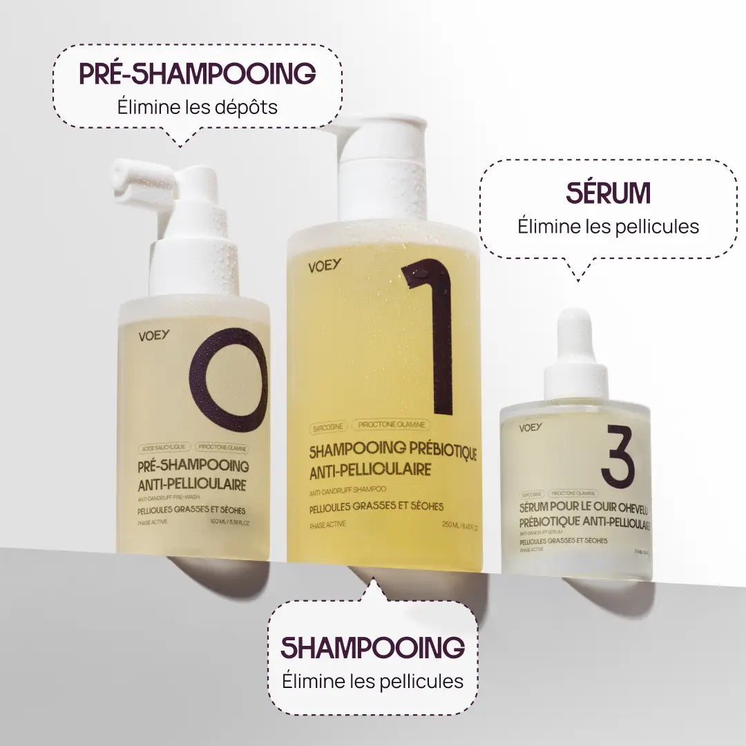 Three VOEY haircare bottles arranged on a light gray background with French callout labels pointing to each: Pré-Shampooing, Shampooning, and Sérum. The bottles contain pale yellow liquid and have white caps and white labels with large black numbers 1, 0, and 3.